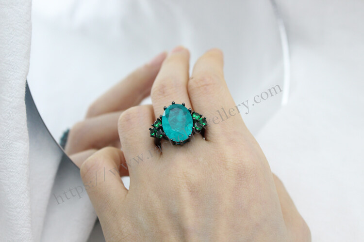 big blue oval and green pear ring.jpg