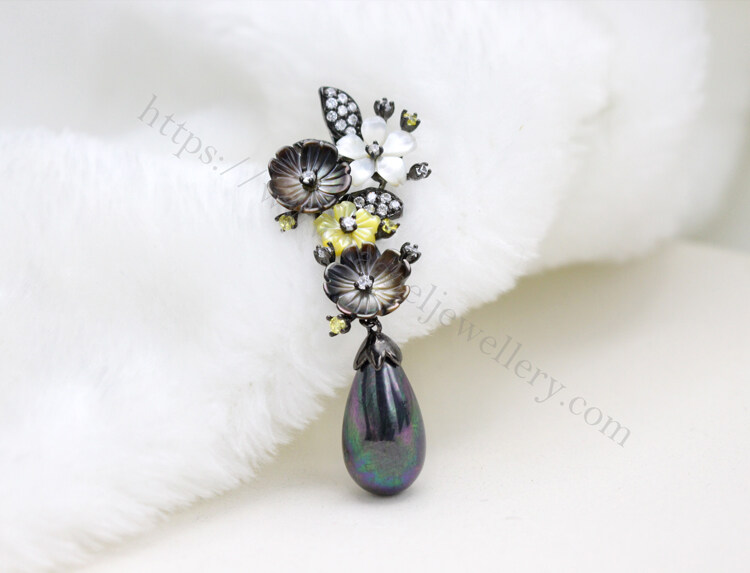 shell flower design with big black pearl drop pendant.jpg