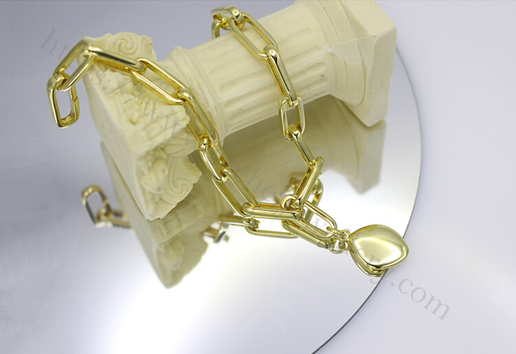 Solid gold paperclip chain bracelet suppliers.jpg
