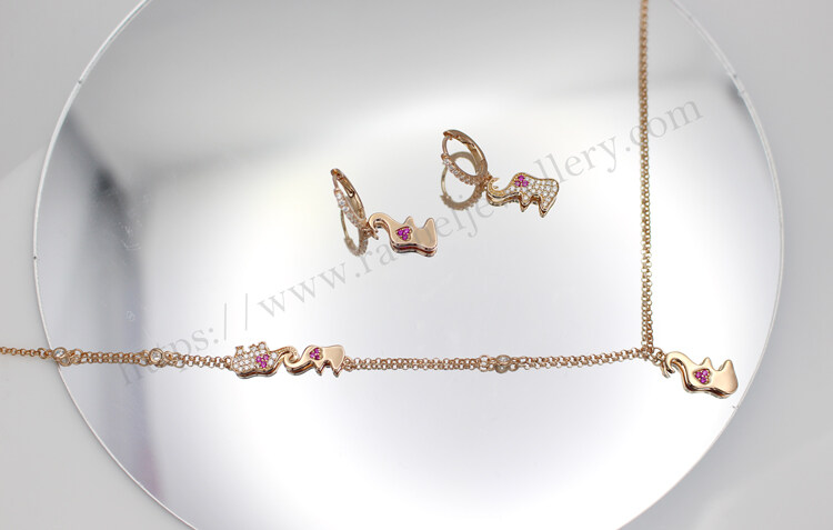 Rose gold elephant earrings suppliers.jpg