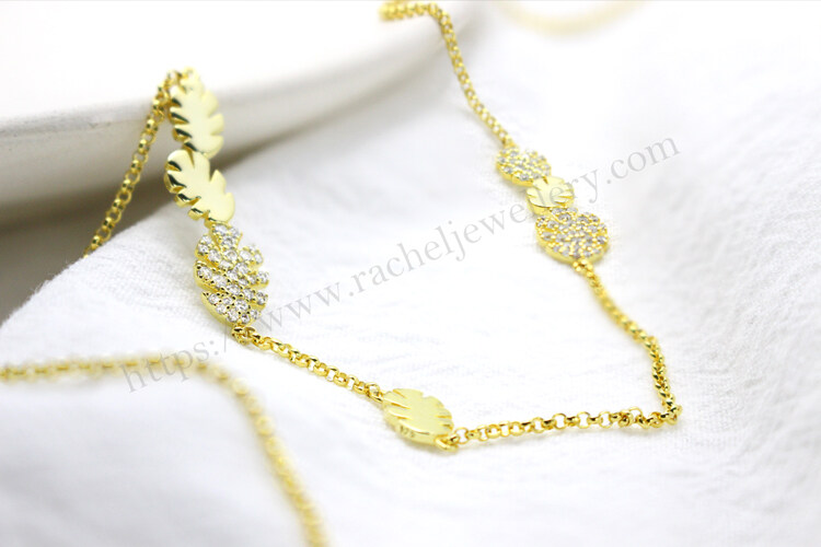 Customized gold monster leaf necklace factory.jpg