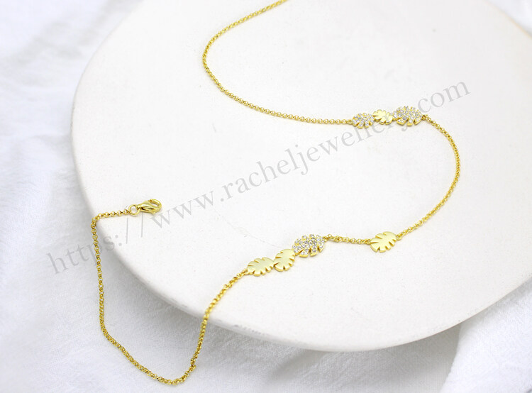 China gold Monstera leaf necklace.jpg