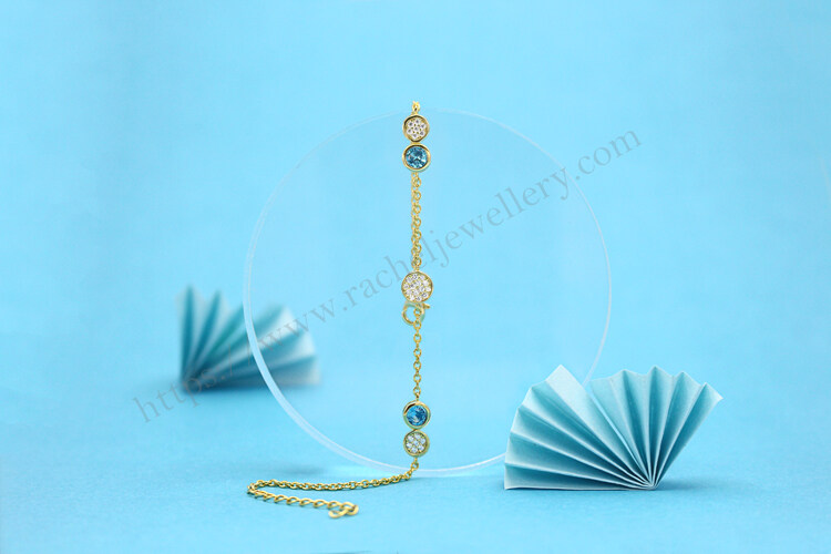 Customized yellow gold gemstone bracelet.jpg