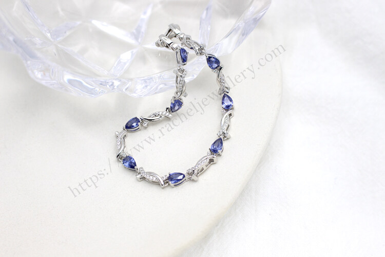 Customized silver tanzanite bracelet.jpg