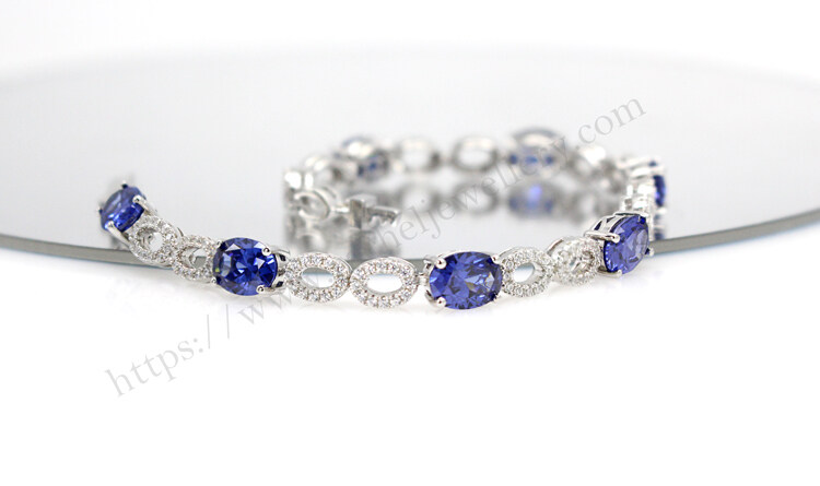 Customized oval tanzanite bracelet.jpg