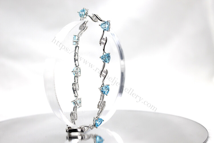 Aquamarine charm bracelet factory.jpg