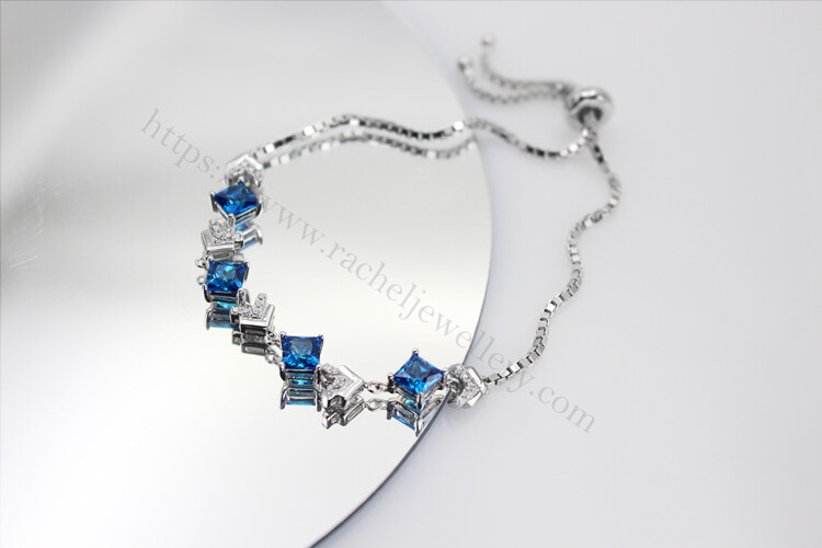 Customized blue topaz bolo bracelet.jpg