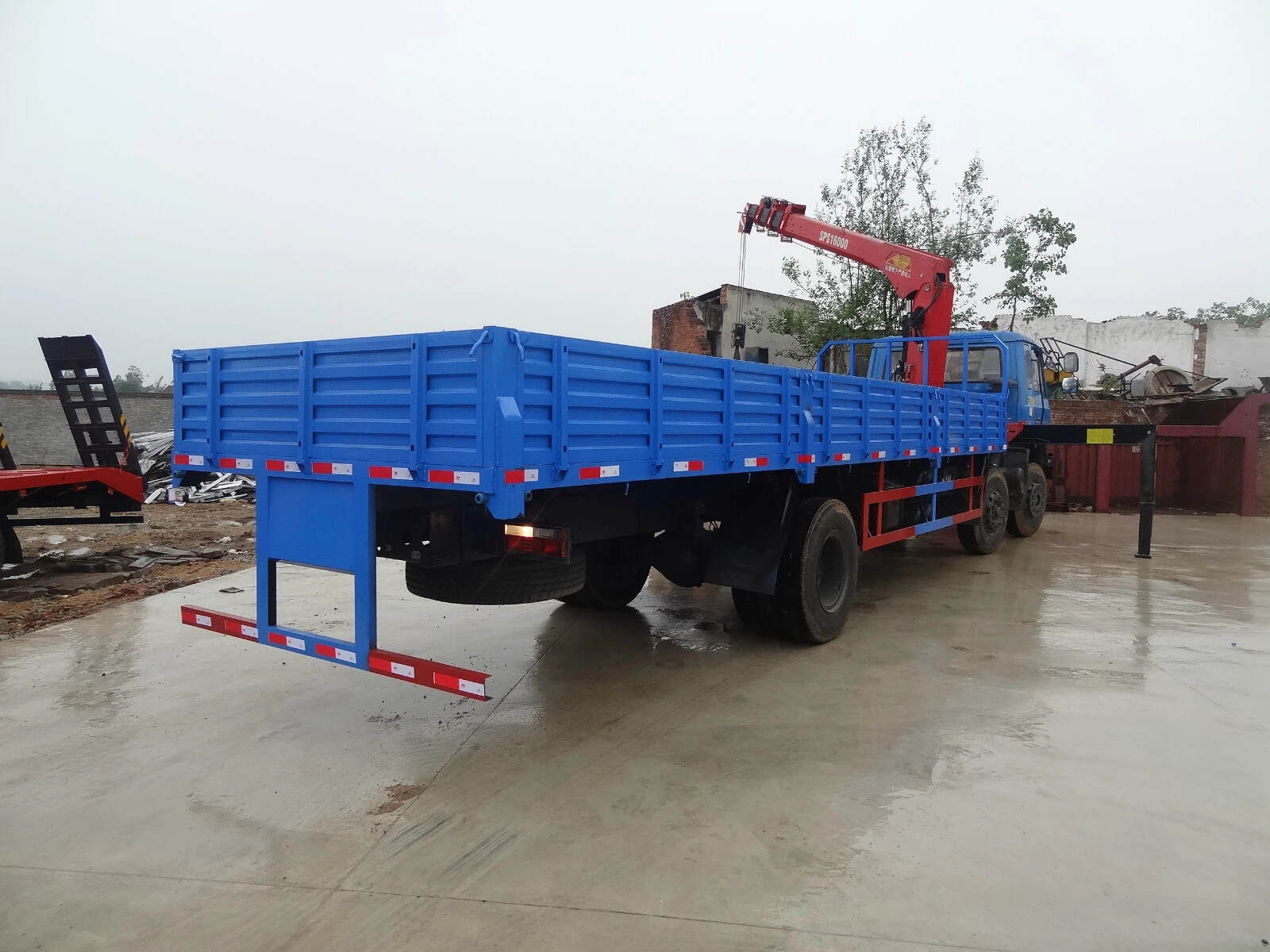 flatbed with crane truck