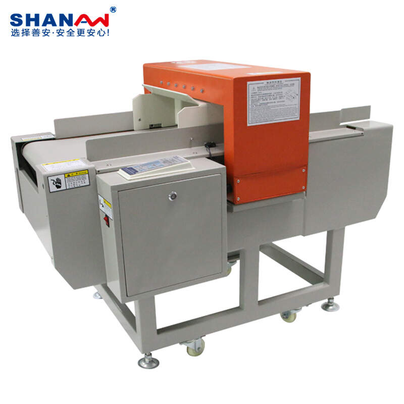 Automatic conveyor needle detector