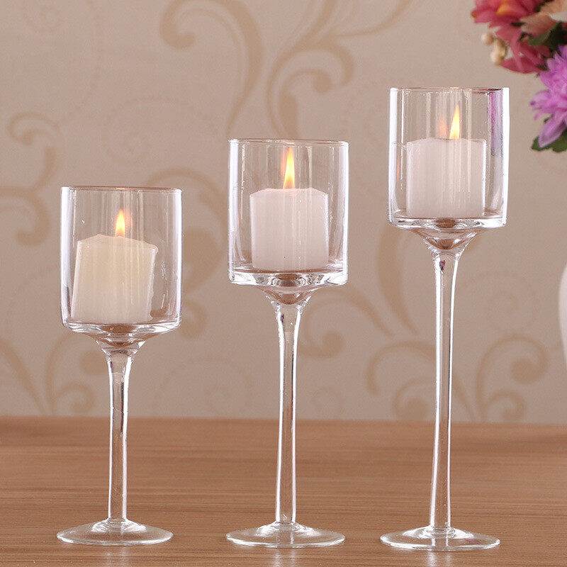 Tall transparent glass candle holder