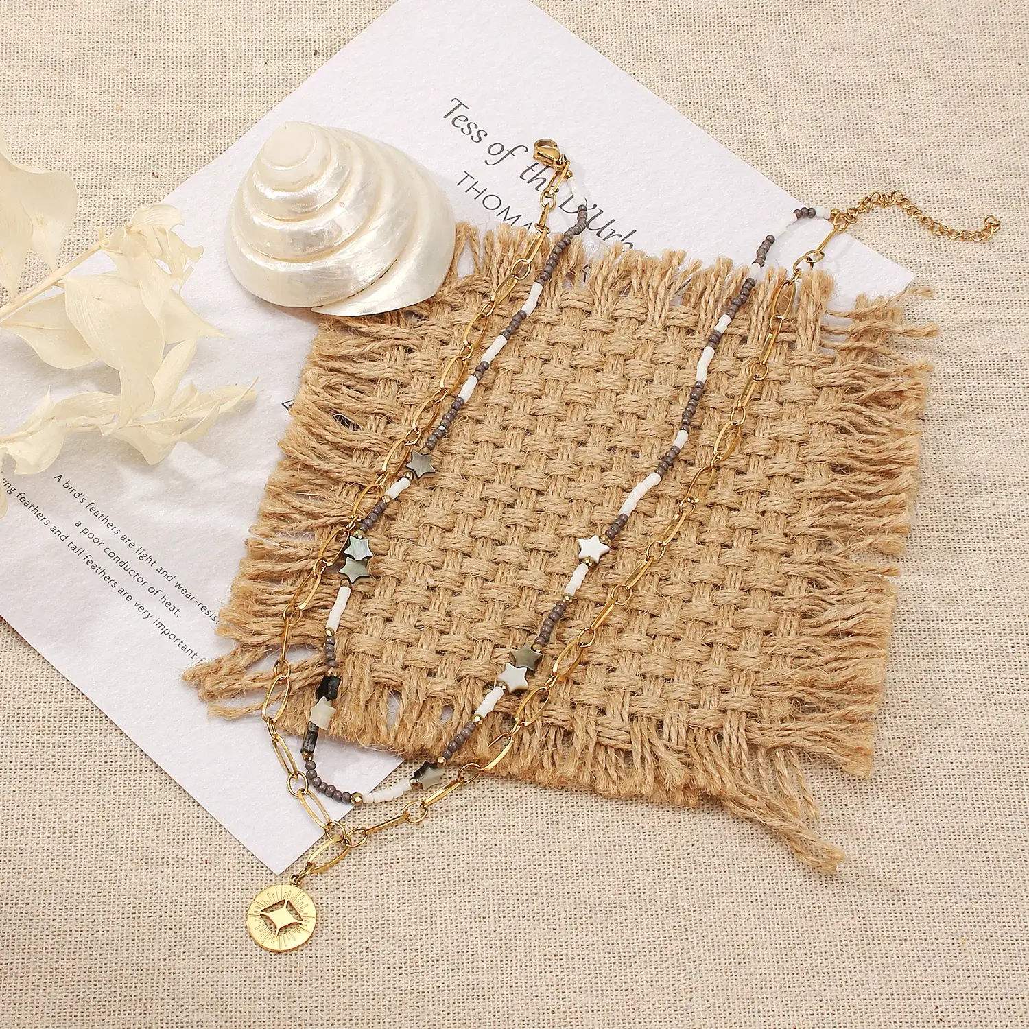 black and white  shell star  mixed with crystal beads hollow pendant stainless steel 2 layers necklace  (2).webp