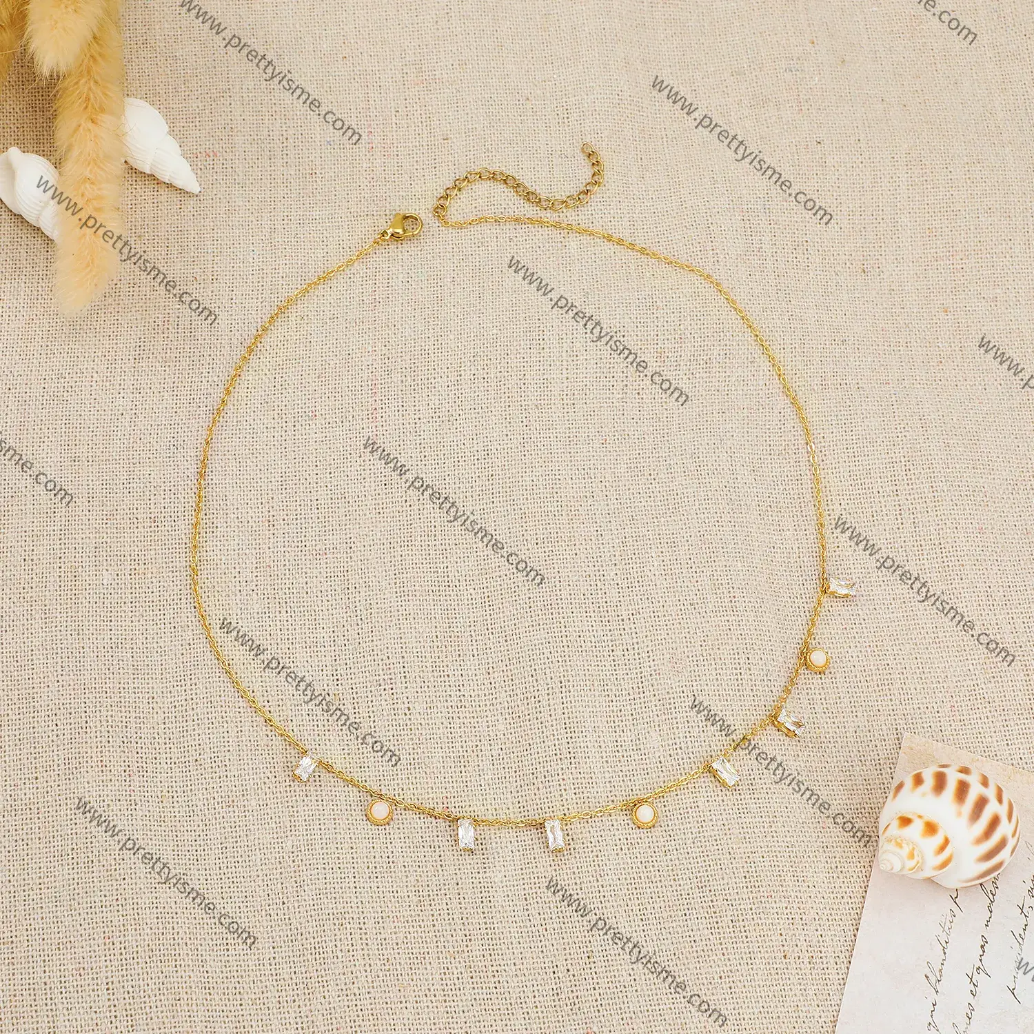French style pendant chain set with diamonds pearls gold-plated simple stainless steel necklace.webp