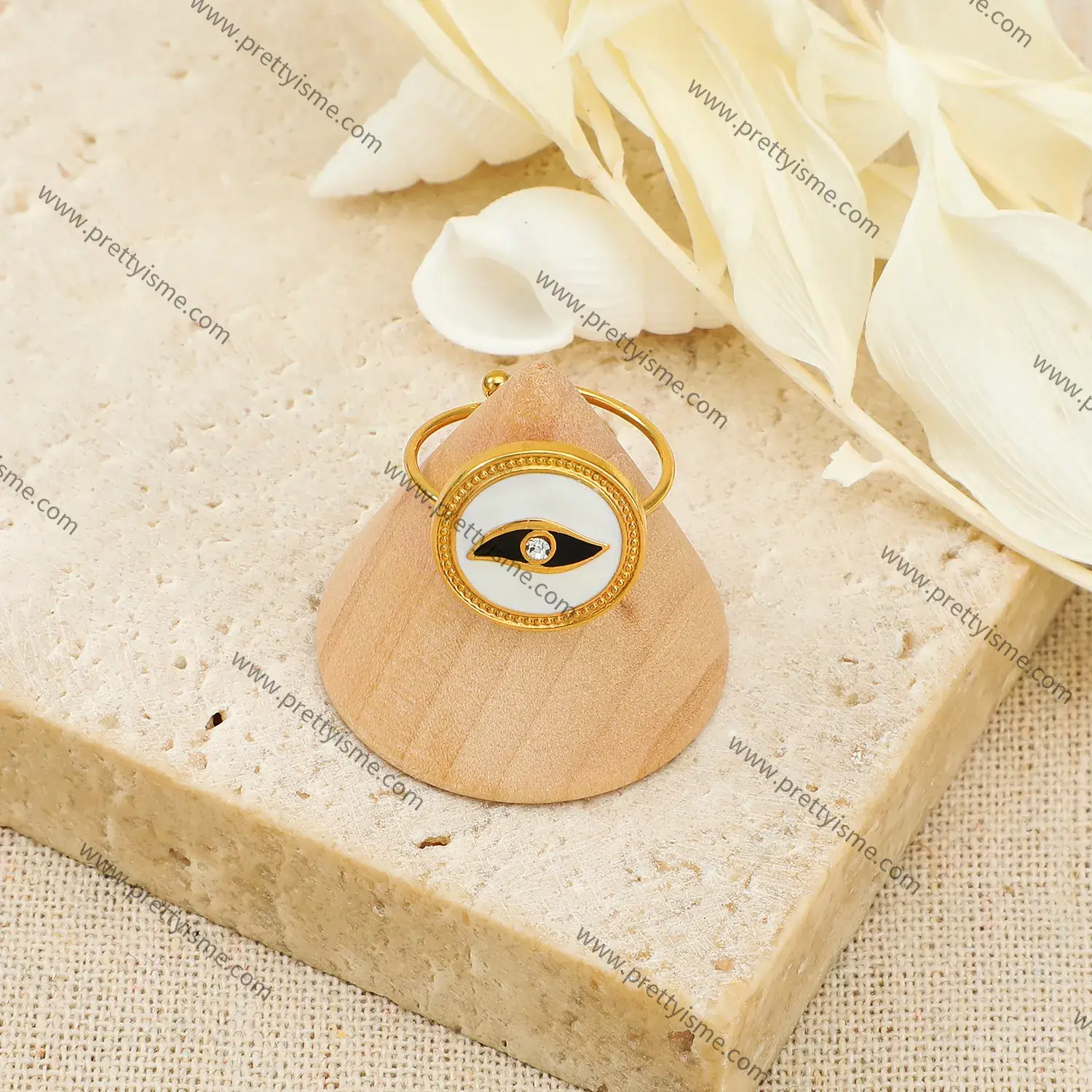 Stainless steel and 18K gold plated abstract eye motif with diamond round open ring (3).webp