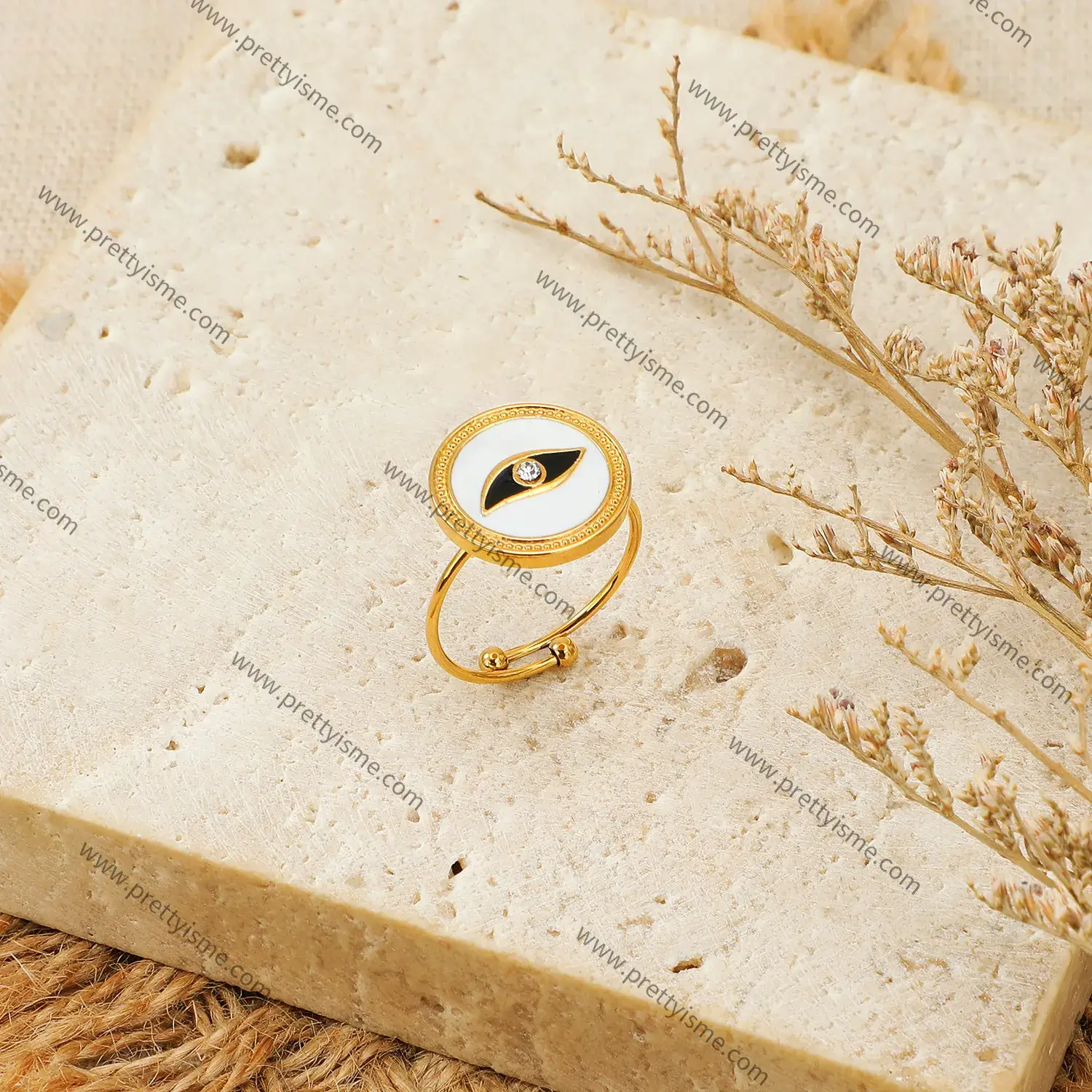 Stainless steel and 18K gold plated abstract eye motif with diamond round open ring (4).webp