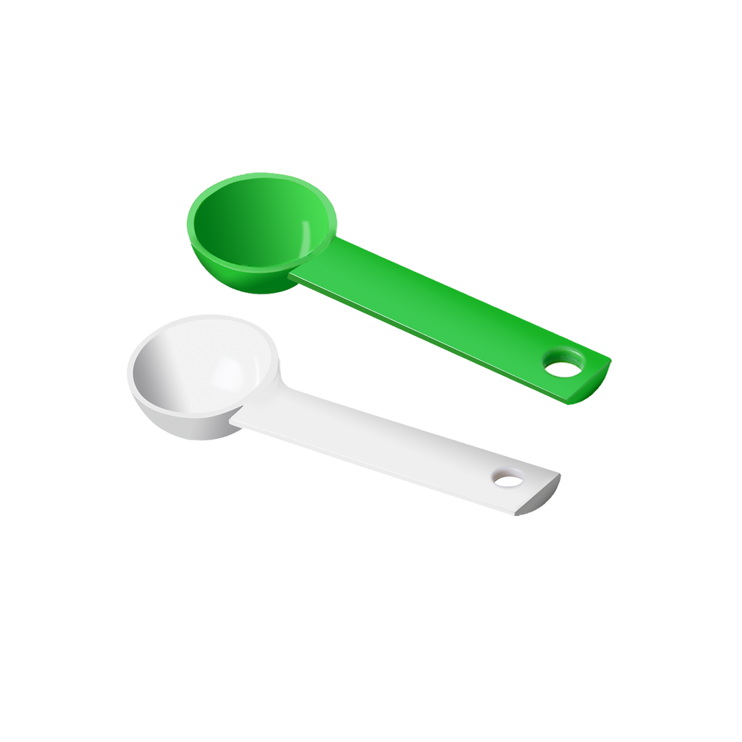 Plastic green and white dosing spoon for impression material