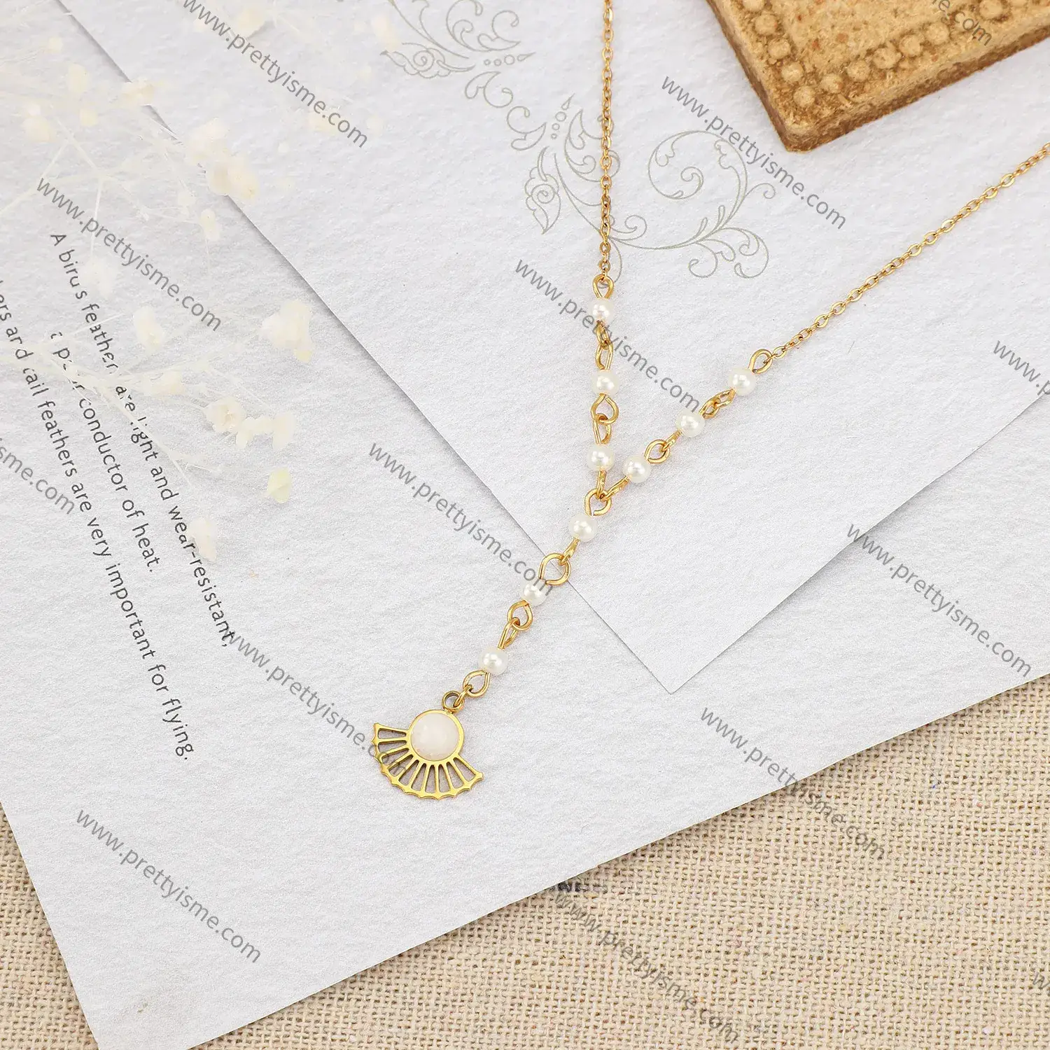 Elegant pearl stainless steel 18k gold plated necklace long pendant fan with gem necklace (3).webp