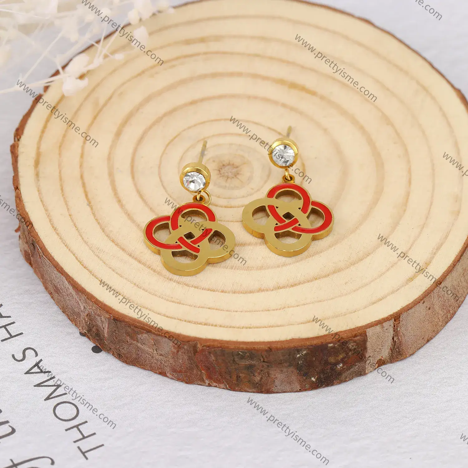 Interleaving circular stainless steel 18K gold-plated with round diamond epoxy exquisite elegant earring.webp