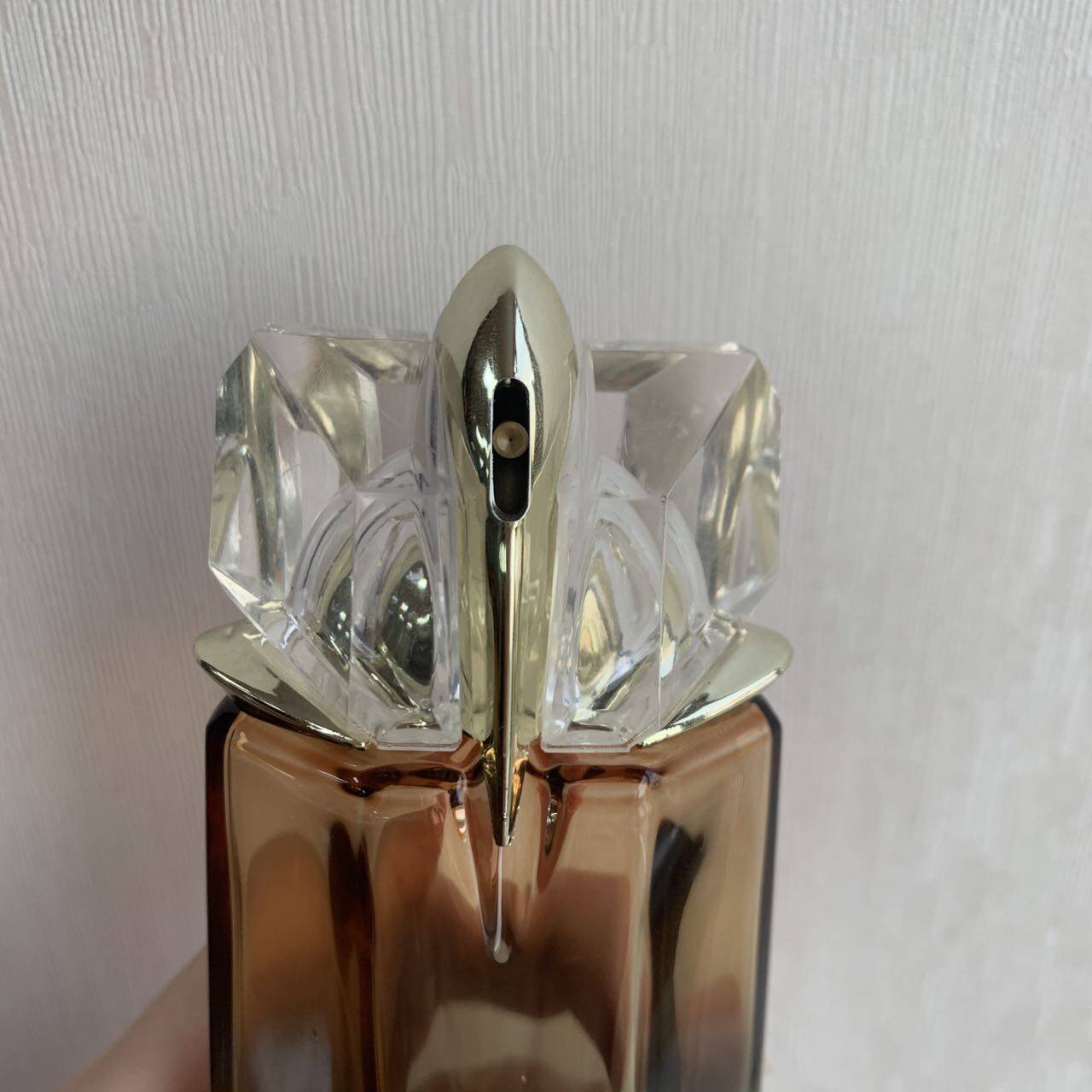 blue diamond shaped perfume bottle