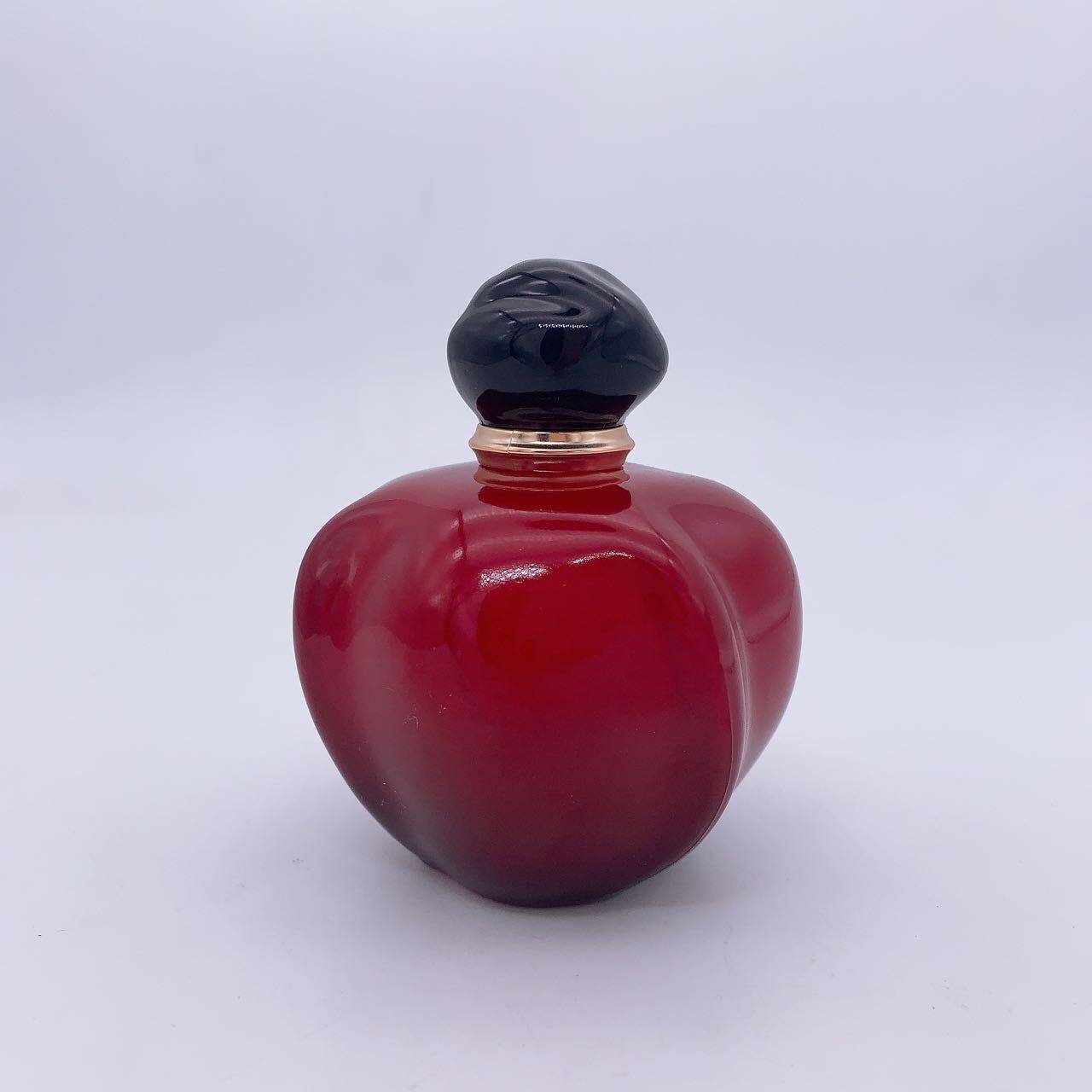 pink colored perfume bottle.jpg