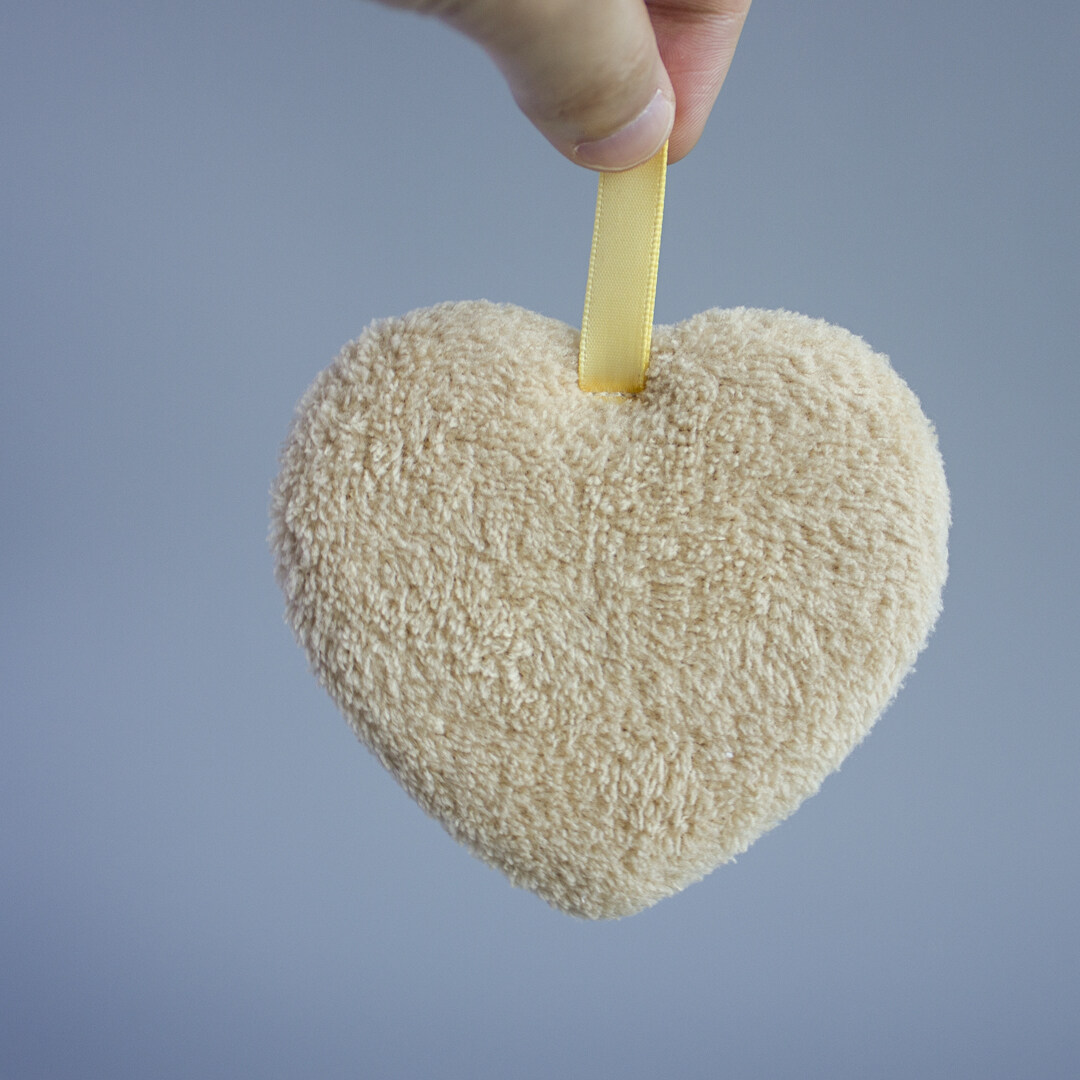 Facial cleansing puff heart-shaped