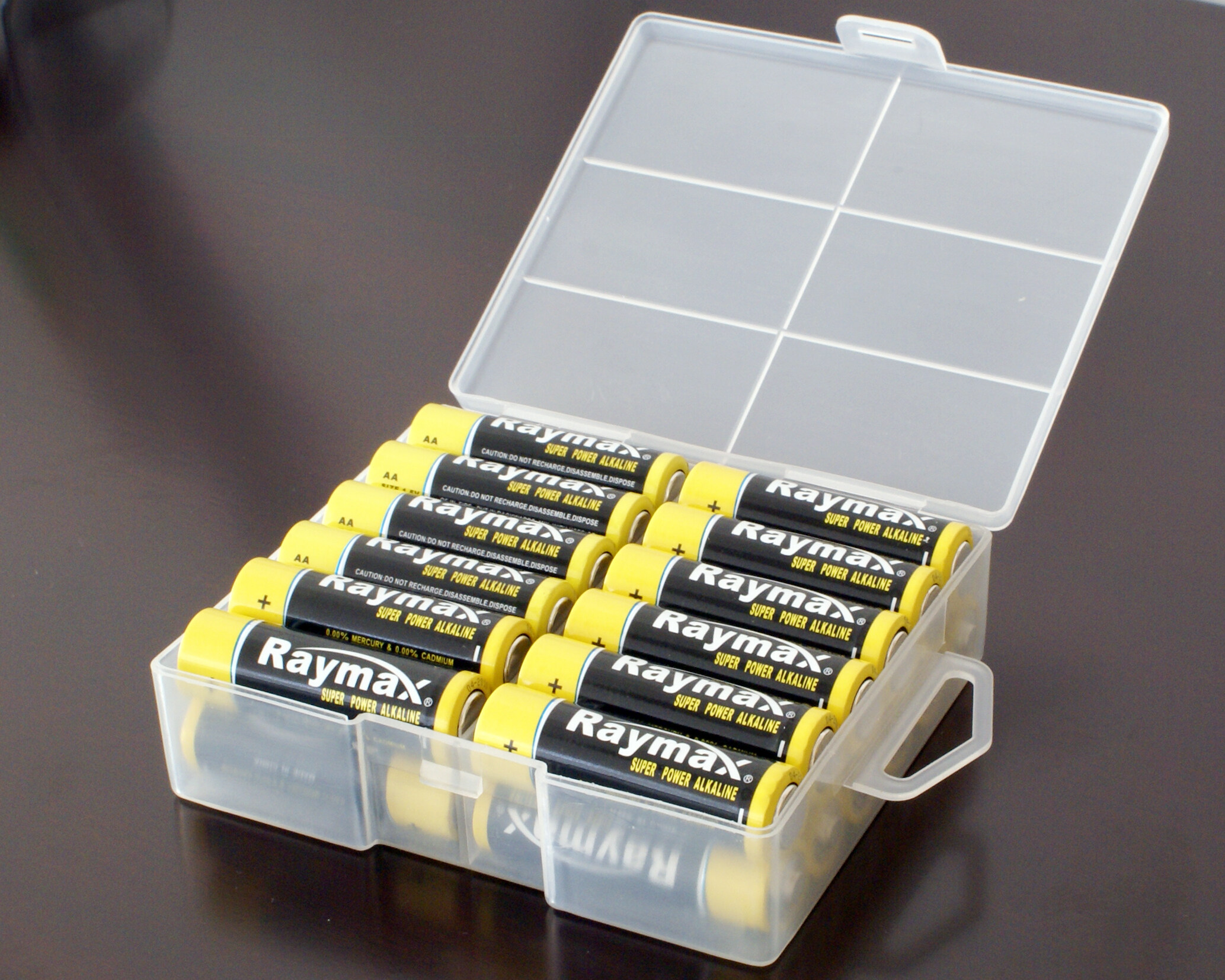 How should alkaline batteries be stored?