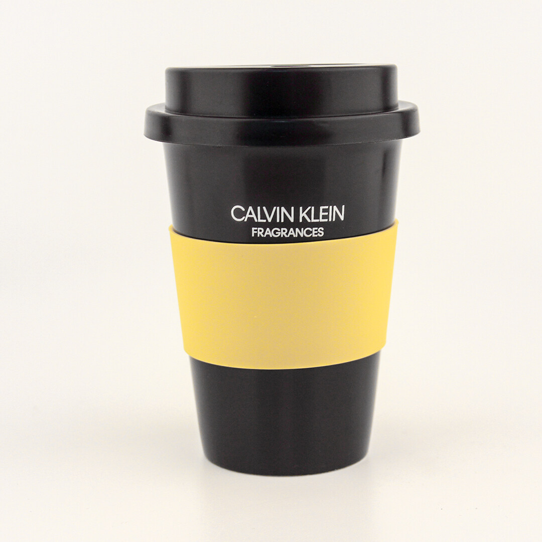 Black ceramic water cup with yellow sleeve for Calvin Klein