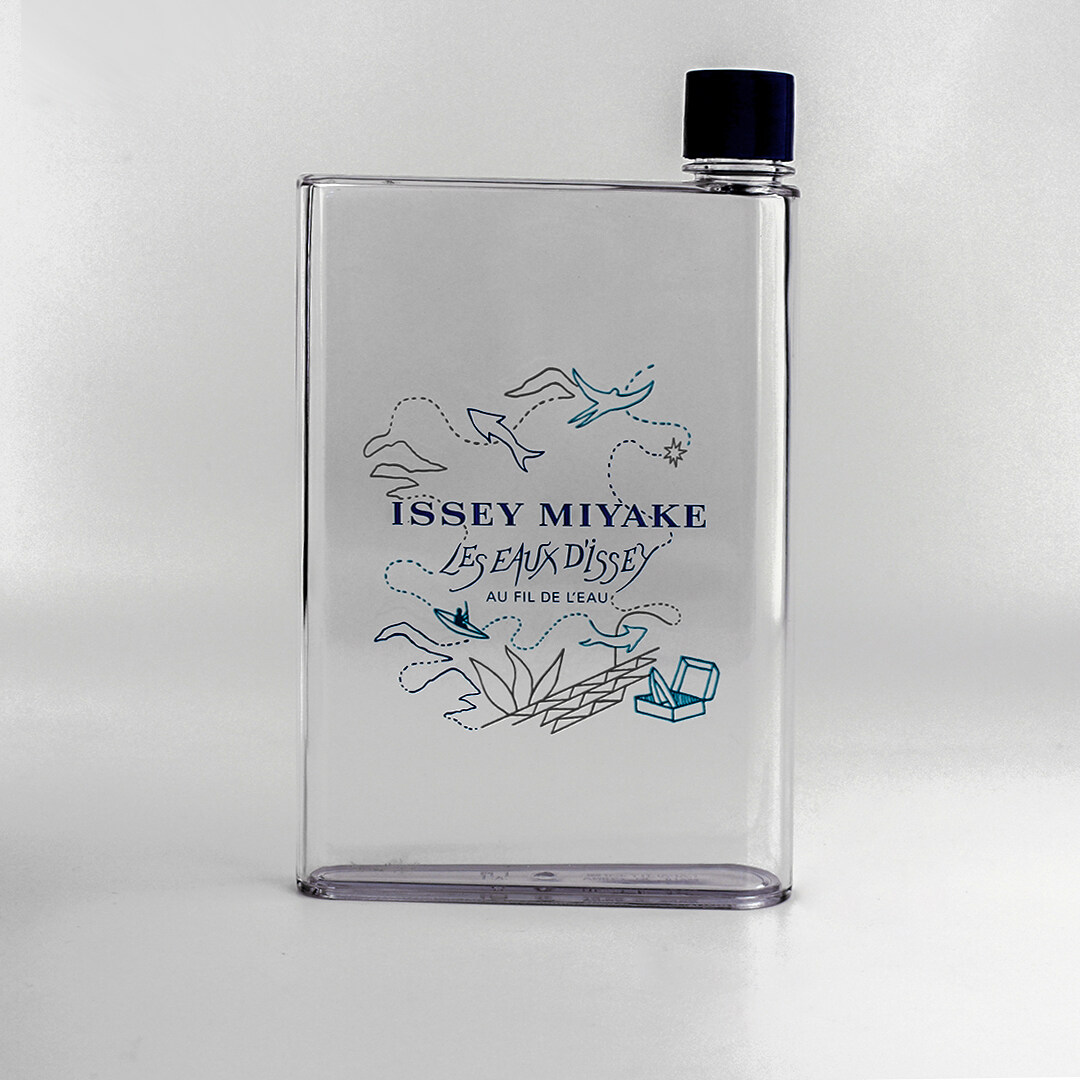 Rectangular plastic water bottle with bule top for Issey Miyake