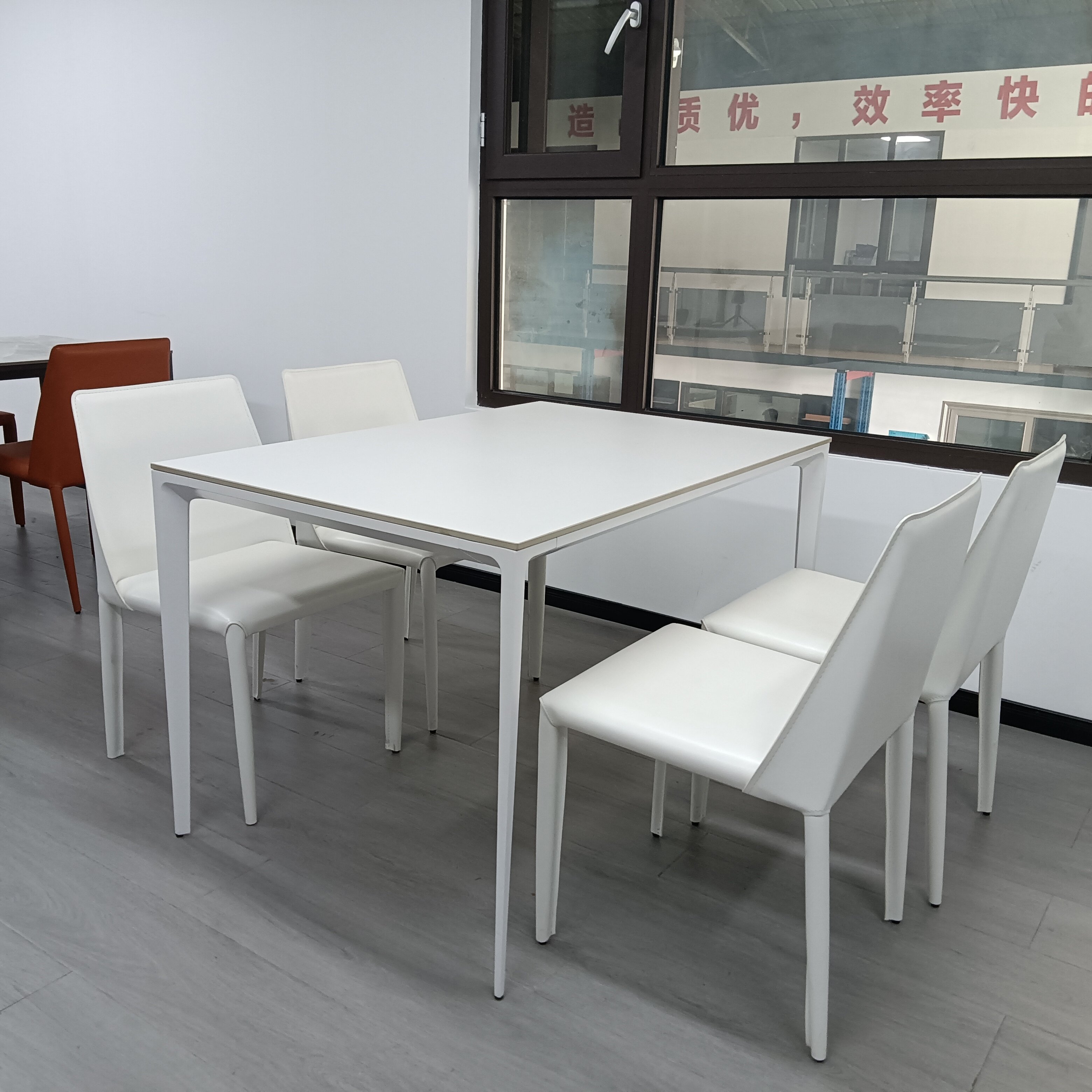 The Slate Dining Table with Aluminum Legs: A Perfect Blend of Elegance and Durability