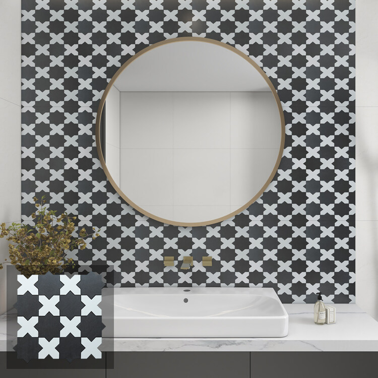 star and cross mosaic tile behind bathroom mirror