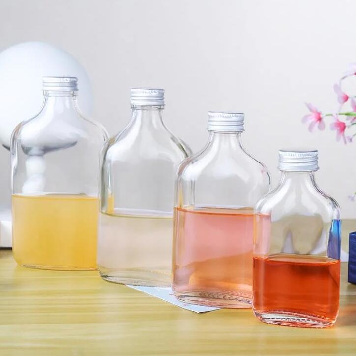 vintage round bottom glass bottle, China flat round glass wine bottle, China 12 oz boston round glass bottles manufacturer