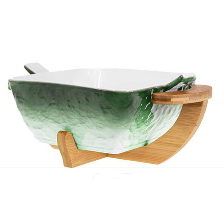 bowl crockery; salad bowl with wooden stand; ceramic salad bowl with stand