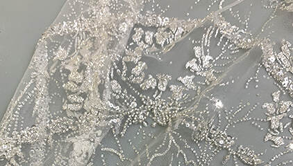 Sparkling embroidery fabric