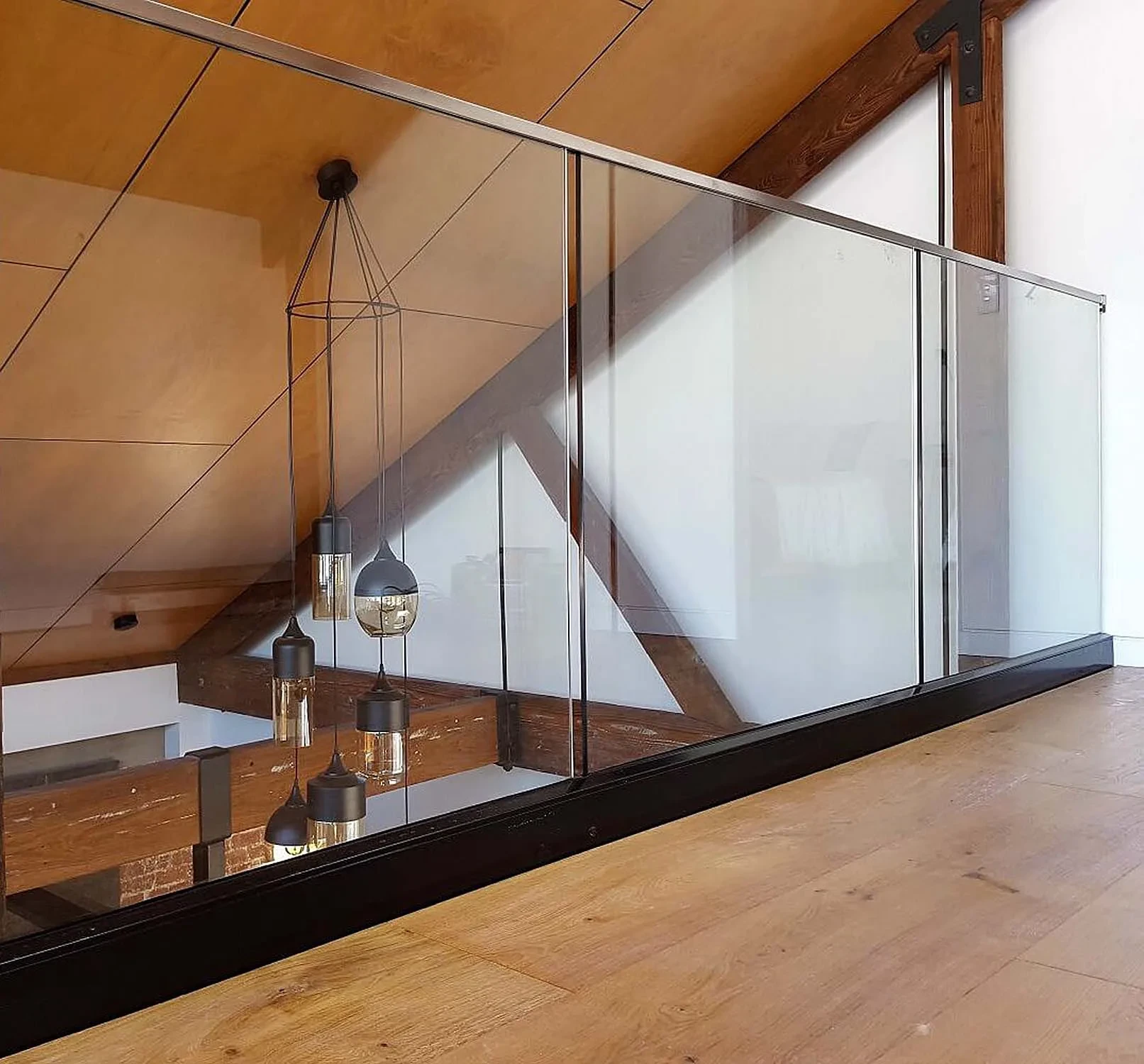Transforming Spaces: The Modern Aesthetic of Glass Railing with Standoffs
