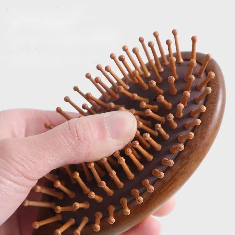 Wooden hair brush