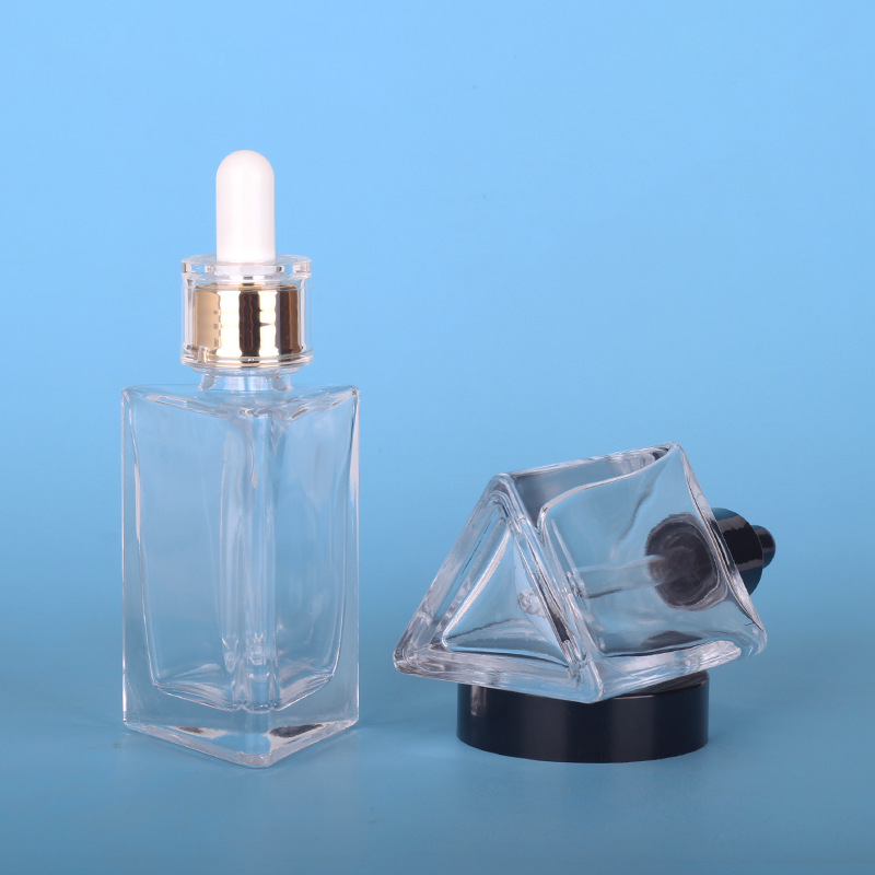 Triangle transparent oil bottle