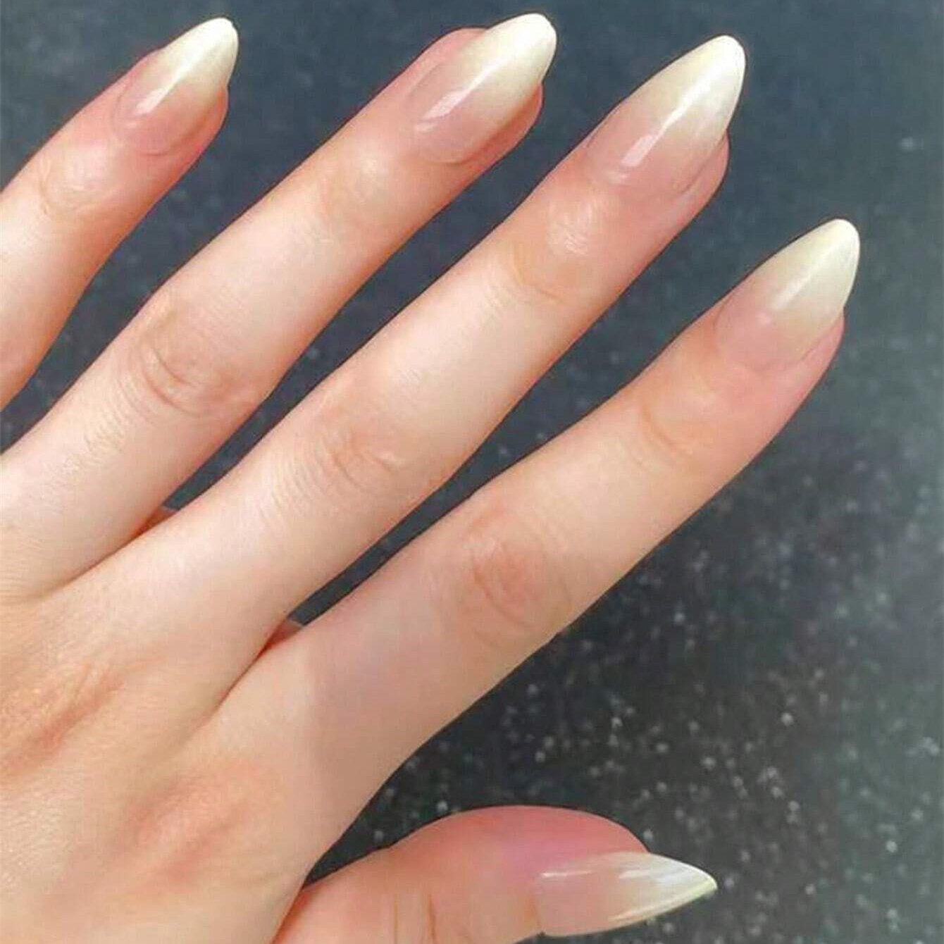 24 medium length almond shaped bare and milky white fake nails