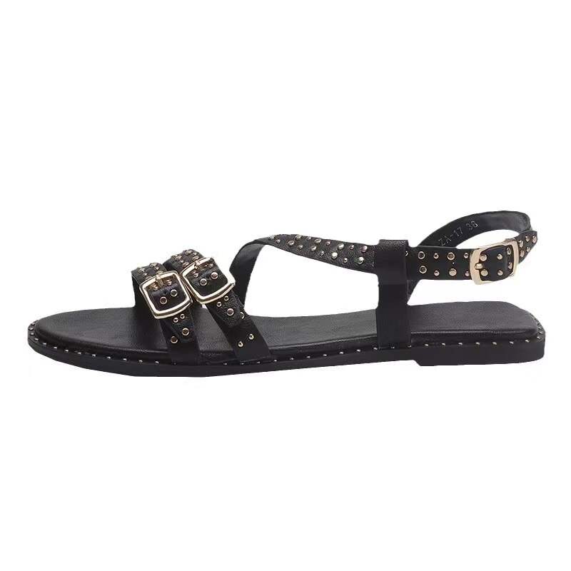 Estefina Retro rivets with a straight buckle and tie flat sandals