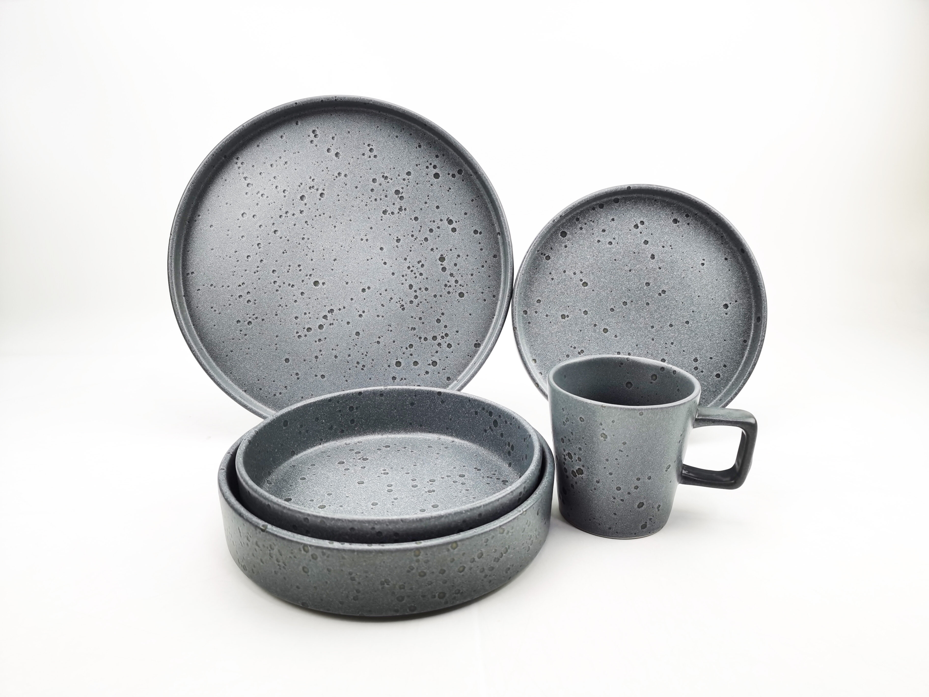 Matt plain ceramic plate and mug and bowl in dots or pure color