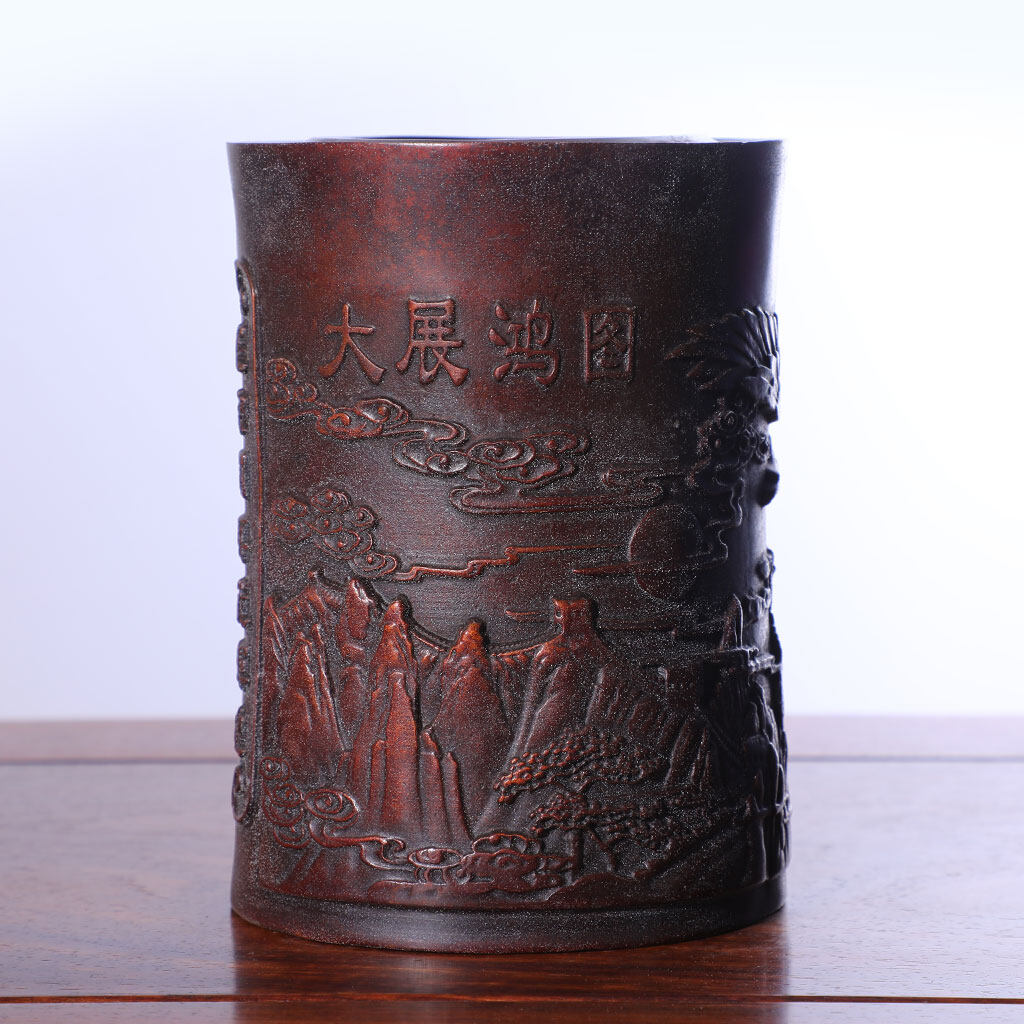 Copper brown red pen container artefact