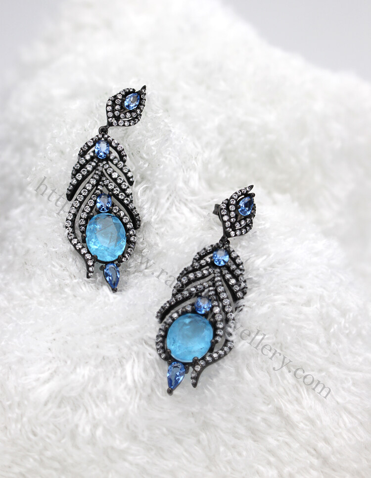 blue peacock feather earrings.jpg