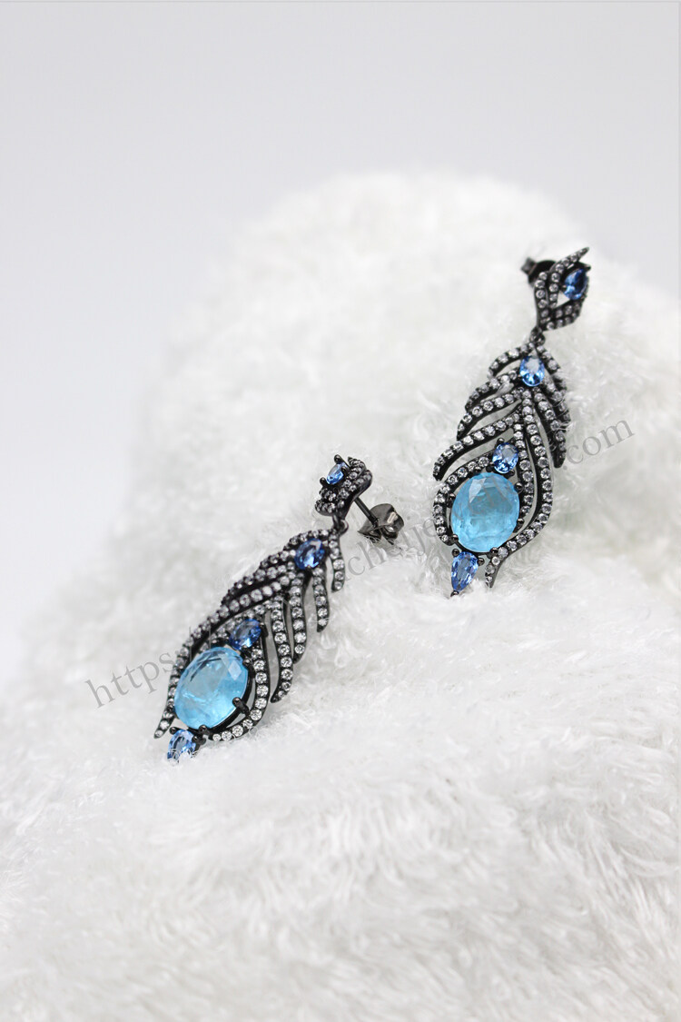 popular silver peacock feather earrings.jpg