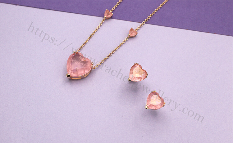 Pink heart-shaped green stone jewelry set.jpg
