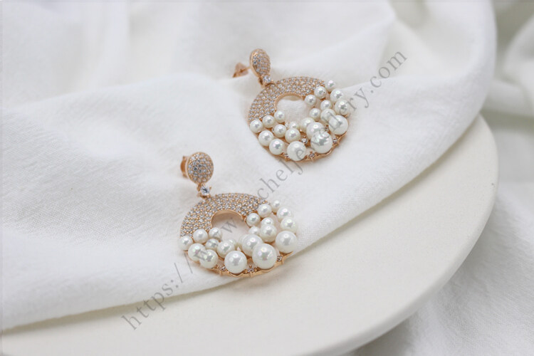 Big pearl and shell earrings.jpg