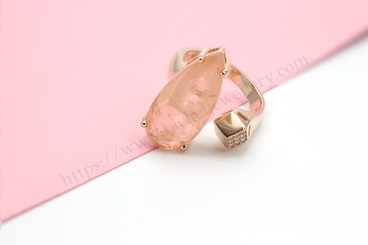 pear shaped morganite ring with diamonds in 14k rose gold.jpg