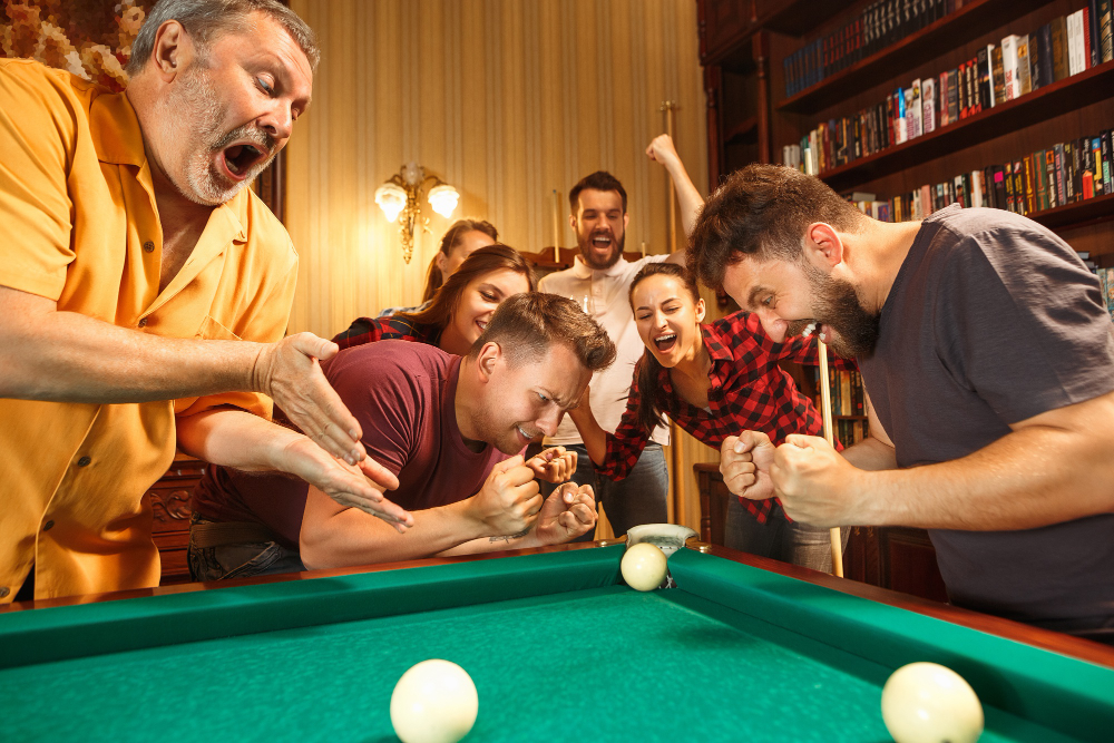 Friends enjoying a game on the 8ft MD Sports Pool Table.jpg