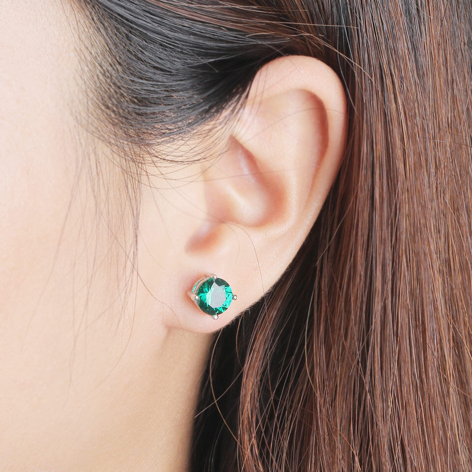 sterling silver emerald stud earrings, stud earrings emerald, emerald cut stud earrings, emerald stud earrings on ear, women's emerald stud earrings