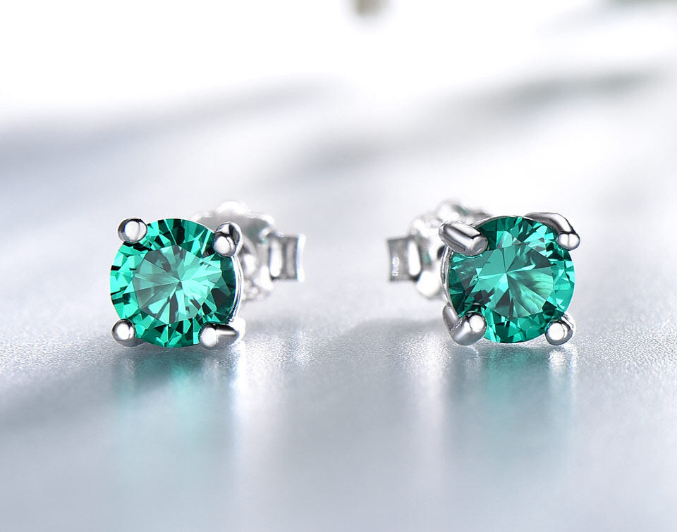 sterling silver emerald stud earrings, stud earrings emerald, emerald cut stud earrings, emerald stud earrings on ear, women's emerald stud earrings