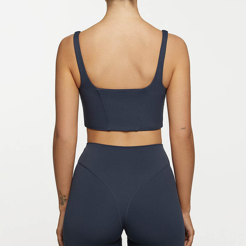 corset yoga top, ribbed seamless sports top, padded workout tank, sculpting fitness crop, women activewear gym tank, corset style yoga shirt, breathable yoga clothing, sleeveless yoga top