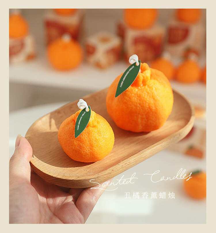 Orange-shaped candle