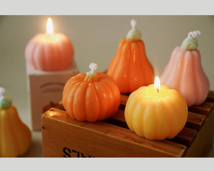 Pumpkin-shaped candle